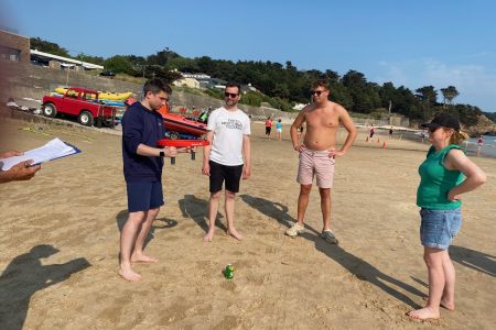 corporate teambuilding activity in St Brelades Bay Jersey with Hi5