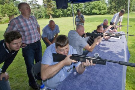 Delegates taking part in a corporate event air rifles scrabble in Swindon