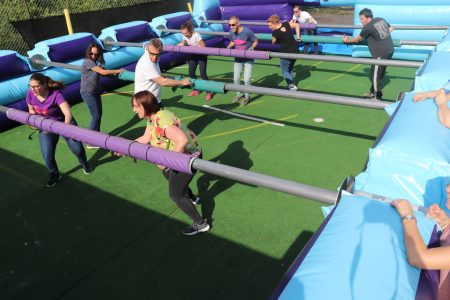human table football game being used for a tv event