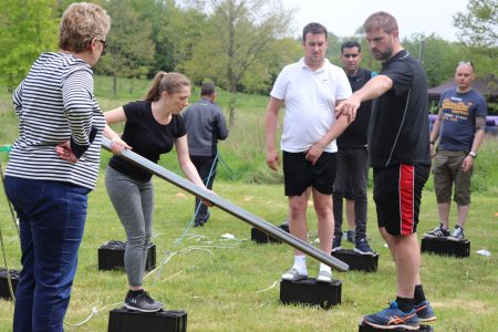 delegates taking part in a team building challenge at CIM Business centre Maidenhead Berkshire