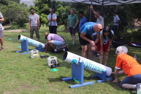 delegates competing in the Rocket activity for a corporate teambuilding event.