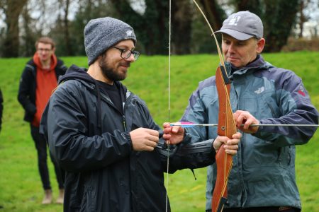 Archery team building challenge at cim moor hall in Cookham Berkshire with Hi5 events